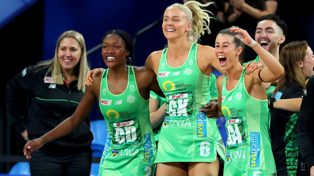 Sunday Aryang, Rudi Ellis and Emma Cosh of the fever celebrate from the bench during the Super Netball Grand Final match between West Coast Fever and Melbourne Vixens at RAC Arena, on July 03, 2022, in Perth, Australia. (Photo by James Worsfold/Getty Images)