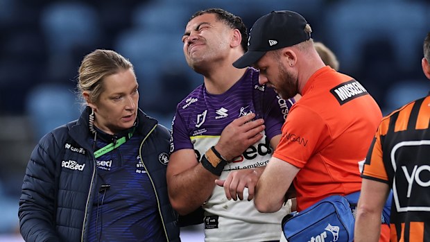 Jahrome Hughes leaves the field injured against the Roosters.