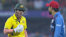 David Warner and Rashid Khan exchanged words early in Australia's innings. 