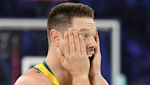 Matthew Dellavedova, of Australia, reacts after committing a foul against Greece in a men's basketball game at the 2024 Summer Olympics, Friday, Aug. 2, 2024, in Villeneuve-d'Ascq, France. (AP Photo/Mark J. Terrill)