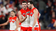Tom McCartin and Paddy McCartin celebrate after a goal.