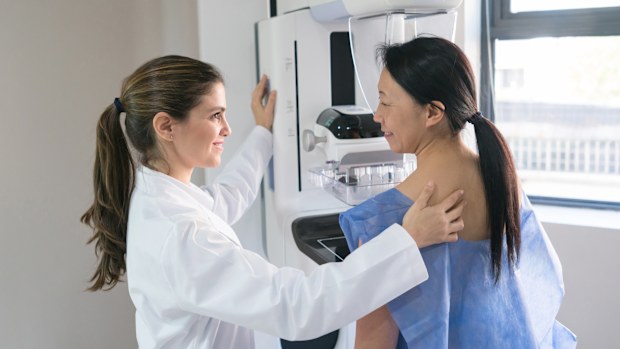 Woman undergoing mammogram test