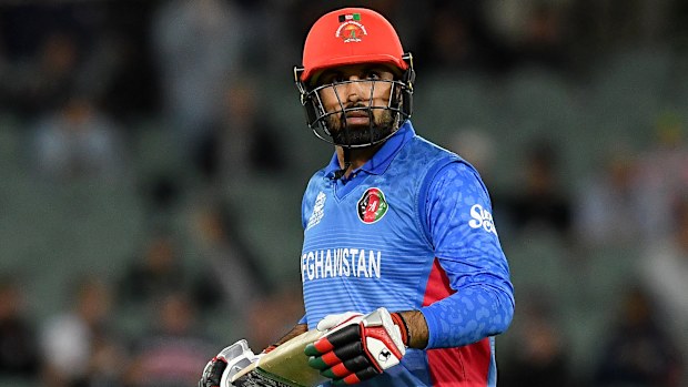 Mohammad Nabi reacts to losing his wicket during theT20 World Cup match between Australia and Afghanistan.