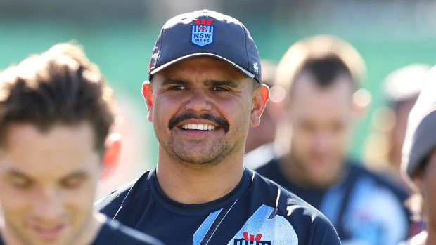 Latrell Mitchell smiles at New South Wales Blues State of Origin training.