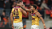 Callum Ah Chee celebrates the Lions' win. 