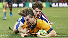 Michael Hooper of the Wallabies scores a try at AAMI Park.