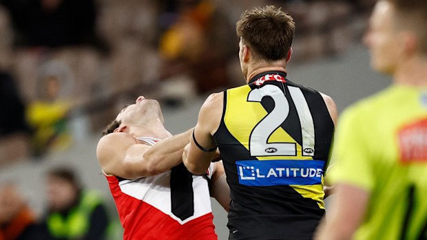 MELBOURNE, AUSTRALIA - JUNE 17: Max King of the Saints and Noah Balta of the Tigers wrestle during the 2023 AFL Round 14 match between the Richmond Tigers and the St Kilda Saints at the Melbourne Cricket Ground on June 17, 2023 in Melbourne, Australia. (Photo by Michael Willson/AFL Photos via Getty Images)