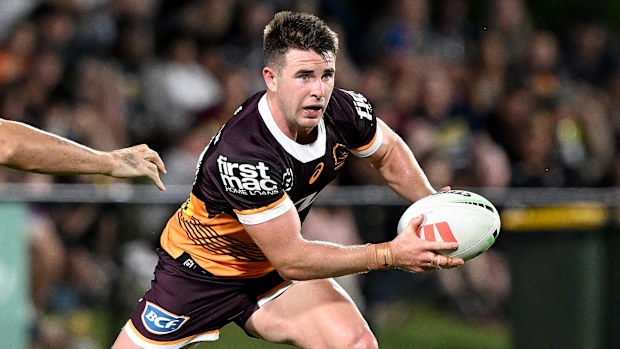 SUNSHINE COAST, AUSTRALIA - FEBRUARY 18: Jock Madden of the Broncos breaks away from the defence during the NRL Trial Match between the Brisbane Broncos and the North Queensland Cowboys at Sunshine Coast Stadium on February 18, 2023 in Sunshine Coast, Australia. (Photo by Bradley Kanaris/Getty Images)