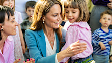 REGGIO EMILIA, ITALY - MAY 13: Catherine, Princess of Wales hugs a child as she visits Scuola Comunale d'infanzia Anna Frank, a municipal pre-school for 3  6-year-olds  during the first day of her visit to Reggio Emilia on May 13, 2026 in Reggio Emilia, Italy. The Princess of Wales is visiting the city in Northern Italy as The Royal Foundation Centre for Early Childhood expands internationally. During her visit, she will explore leading approaches to early child development, which focusses on cr