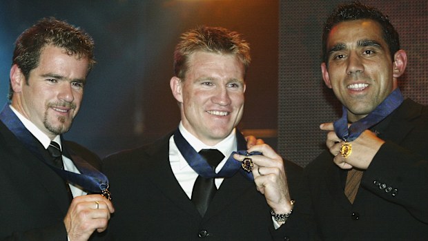 Mark Ricciuto of Adelaide, Nathan Buckley of Collingwood and Adam Goodes of Sydney with their medals.