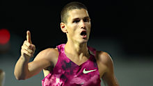 Cameron Myers celebrates winning the men's 1500 metres.