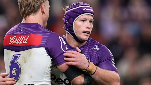 SYDNEY, AUSTRALIA - JULY 24: Harry Grant of the Storm celebrates scoring a try with Tyran Wishart of the Storm during the round 21 NRL match between the Sydney Roosters and Melbourne Storm at Allianz Stadium on July 24, 2025.