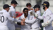 KARACHI, PAKISTAN - DECEMBER 19: Rehan Ahmed of England is congratulated on the wicket of Mohammad Rizwan of Pakistan during day three of the Third Test between Pakistan and England at Karachi National Stadium on December 19, 2022 in Karachi, Pakistan. (Photo by Matthew Lewis/Getty Images)