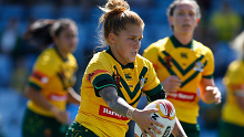 Caitlin Moran shapes to kick during the 2017 Women's Rugby League World Cup match between Australia and England.