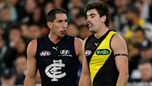 MELBOURNE, AUSTRALIA - MARCH 12: Jonty Faull of the Tigers and Jacob Weitering of the Blues clash during the 2026 AFL Round 01 match between the Carlton Blues and the Richmond Tigers at the Melbourne Cricket Ground on March 12, 2026 in Melbourne, Australia. (Photo by Michael Willson/AFL Photos via Getty Images)