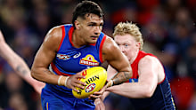 MELBOURNE, AUSTRALIA - AUGUST 02: Jamarra Ugle-Hagan of the Bulldogs and Clayton Oliver of the Demons in action during the 2024 AFL Round 21 match between Footscray and the Melbourne Demons at Marvel Stadium on August 02, 2024 in Melbourne, Australia. (Photo by Michael Willson/AFL Photos via Getty Images)