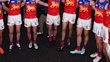 MELBOURNE, AUSTRALIA - AUGUST 02: Lions players sing the song following the round 21 AFL match between Collingwood Magpies and Brisbane Lions at Melbourne Cricket Ground on August 02, 2025 in Melbourne, Australia. (Photo by Morgan Hancock/Getty Images)