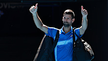 MELBOURNE, AUSTRALIA - JANUARY 24: Novak Djokovic of Serbia acknowledges the crowd as he leaves the court after retiring from the Men's Singles Semifinal against Alexander Zverev of Germany during day 13 of the 2025 Australian Open at Melbourne Park on January 24, 2025 in Melbourne, Australia. (Photo by Darrian Traynor/Getty Images)