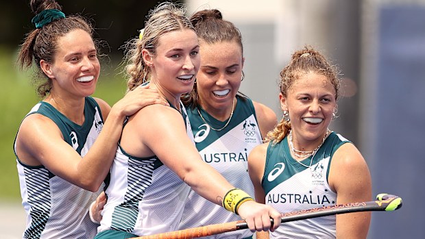 Ambrosia Malone #2 of Team Australia is congratulated by her teammates after scoring a goal against Team China during the Women's Preliminary Pool B match on day three of the Tokyo 2020 Olympic Games at Oi Hockey Stadium on July 26, 2021 in Tokyo, Japan. (Photo by Francois Nel/Getty Images)