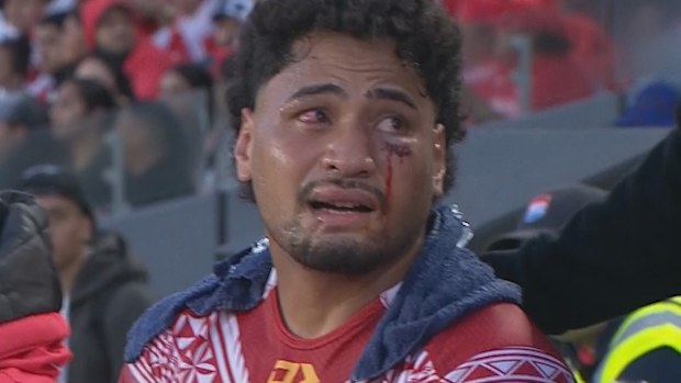 Eli Katoa is seen on the bench for Tonga.