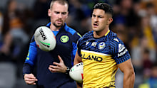 Dylan Brown of the Eels chats to captain Clint Gutherson.