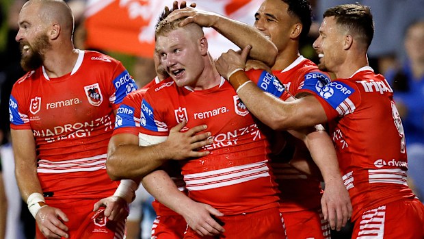 Dylan Egan of the Dragons celebrates.