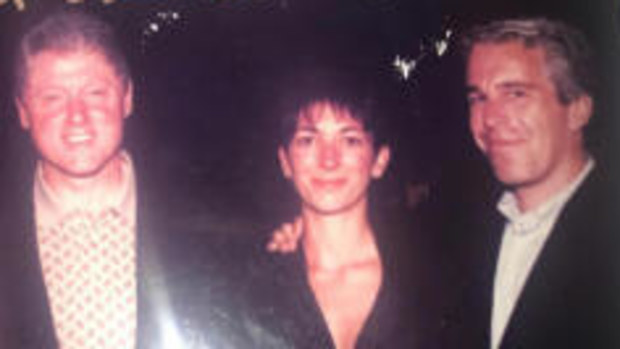 This undated photo released by Democrats on the House Oversight Committee shows former President Bill Clinton, Ghislaine Maxwell and Jeffrey Epstein, with Clinton's signature at the top of the photo.