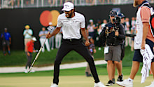 Akshay Bhatia celebrates after winning the tournament on the 18th green.