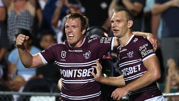 SYDNEY, AUSTRALIA - MARCH 16:  Tom Trbojevic (R) of the Sea Eagles celebrates with Jake Trbojevic of the Sea Eagles after scoring a try during the round three NRL match between Manly Sea Eagles and Parramatta Eels at 4 Pines Park on March 16, 2023 in Sydney, Australia. (Photo by Cameron Spencer/Getty Images)