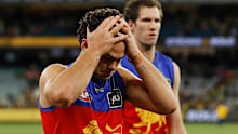MELBOURNE, AUSTRALIA - JULY 31: Cam Rayner of the Lions looks dejected after a loss during the 2022 AFL Round 20 match between the Richmond Tigers and the Brisbane Lions at the Melbourne Cricket Ground on July 31, 2022 in Melbourne, Australia. (Photo by Dylan Burns/AFL Photos)