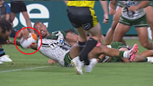 Dane Gagai stops a certain try.
