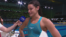 Kaylee McKeown holds back tears as she reflects on her late father's battle with brain cancer.