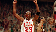 Michael Jordan signs with the Chicago Bulls