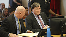 Rex Heuermann, charged in a string of deaths known as the Gilgo Beach killings, appears with his attorney Michael Brown.