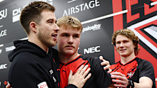 Zach Merrett of the Bombers congratulates Oskar Smartt on his debut.
