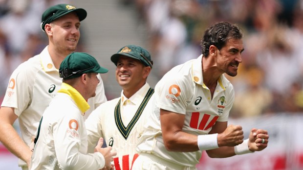 Australia's Mitchell Starc celebrates the wicket of Ben Stokes on day two of the first Ashes Test.