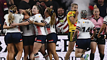 <p>England players congratulate Georgia Roche after she scored a try.</p><p>With the Jillaroos running ﻿in 90 points, it took 69 minutes for England to score their first try. </p><p>With Wigan and Warrington fans in the stands, it was this moment that brought about the biggest cheer during the match.</p><p>"Listen to the roar﻿," Brenton Speed said on Nine. </p>