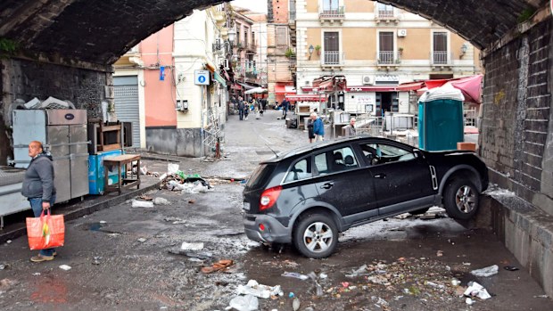 Cars were strewn across streets on Wednesday, and the region is braced for more rain later in the week.