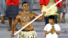Flag bearer Pita Nikolas Aufatofua of Tonga leads his Olympic team during the opening ceremony of the Rio 2016 Olympic Games at Maracana Stadium.
