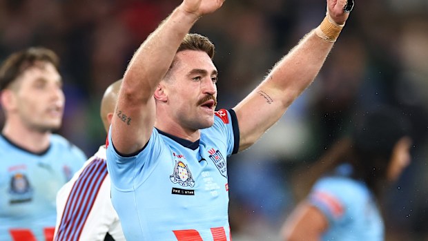 Connor Watson of the Blues celebrates victory in his Origin debut.