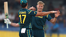 Nathan Ellis of Australia celebrates after taking the wicket of Curtis Campher of Ireland.