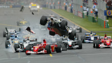 <p>Another year, another pileup. This was one of the biggest in the sport's history. The fuel-heavy Ferrari of Reubens Barrichello was slow off the line and came under pressure from the fast-starting Williams of Ralf Schumacher. </p><p>As they neared turn one, Barichello braked earlier than Schumacher was expecting, causing his car to climb up and over the back of his rival. It was a radical way for Ralf to climb out of his brother Michael's shadow. </p><p>Both spun into the gravel. Behind them, it was pandemonium as several cars swerved to avoid debris, which resulted in further contact between cars. All-told, seven cars were out on the spot. But there was a silver lining…</p>