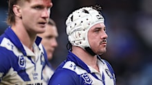 Reed Mahoney of the Bulldogs looks dejected.
