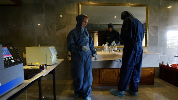 AFP forensics officers working in a makeshift lab set-up in Kuta following the 2005 Bali bombings.