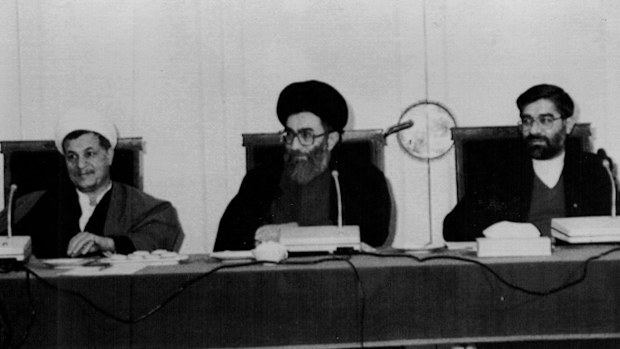 Iran's Majli's speaker and Imam's representative in supreme defence council Hashemi Rafsanjani (L) and Iranian Prime Minister, Hussein Musavi (R) during the session. War-Meeting.  Iranian President Ali Khamenei (M) Chairs a joint session of the cabinet minister. The supreme defence council and the supreme war support council Sunday to draw up the Islamic republic's strategy in relation to the Iraqi imposed war. November 15, 1987.