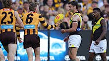 James Sicily taunts Tim Taranto by showing him the ball after he received a free kick. 