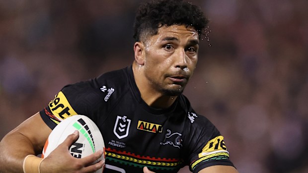 Izack Tago runs the ball during the NRL qualifying final match between Penrith Panthers and Sydney Roosters.