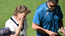 HOBART, AUSTRALIA - MARCH 03: Will Pucovski of the Bushrangers is helped from the field by medical staff after being struck by a delivery from Riley Meredith of the Tigers during the Sheffield Shield match between Tasmania and Victoria at Blundstone Arena, on March 03, 2024, in Hobart, Australia. (Photo by Steve Bell/Getty Images)