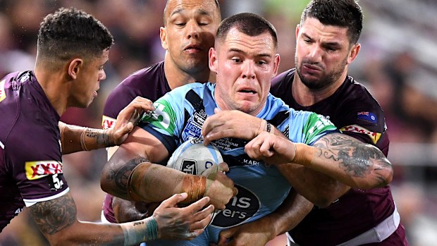 David Klemmer runs the ball for NSW.