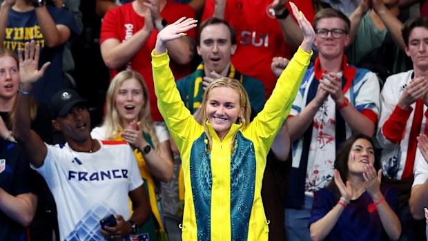 Gold Medalist, Ariarne Titmus of Team Australia acknowledges the fans